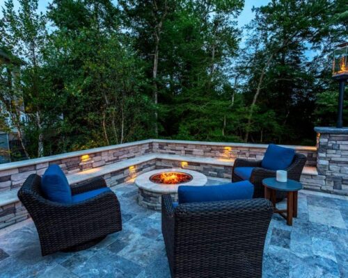 Seating Area and firepit by Ashton Pools by Design