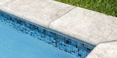 Blue Pool Tile with Silver Travertine Coping