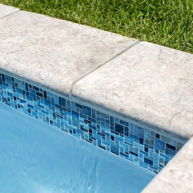 Blue Pool Tile with Silver Travertine Coping