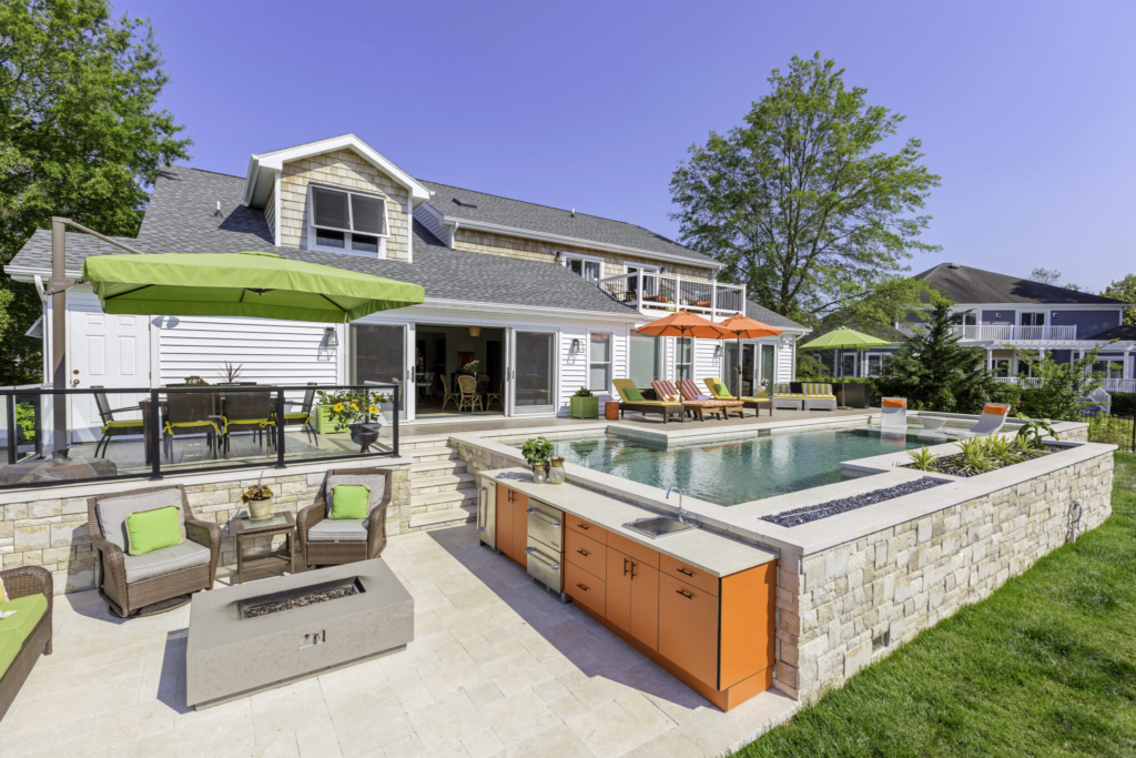 Photograph of a finished custom raised pool and patio