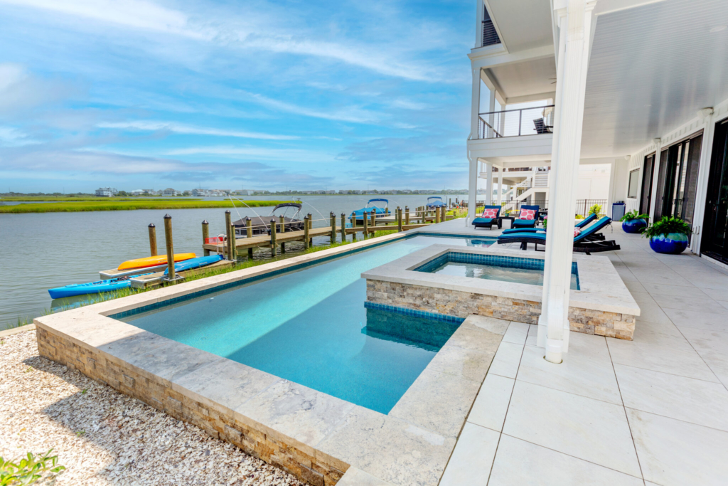 Photograph of a custom raised pool near the bay