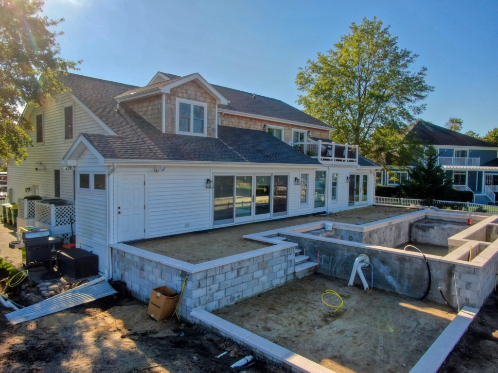 Photograph of construction of a raised pool and patio